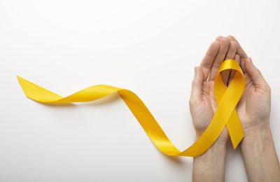 view-yellow-ribbon-with-human-hands